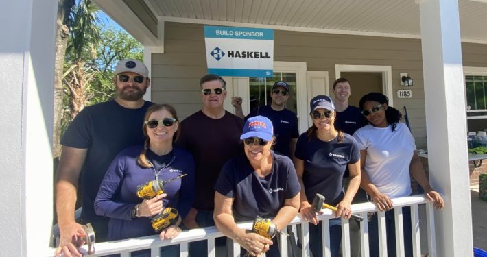 Haskell builds, leads by serving